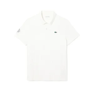 Polo de tennis héritage Ultra Dry avec badge