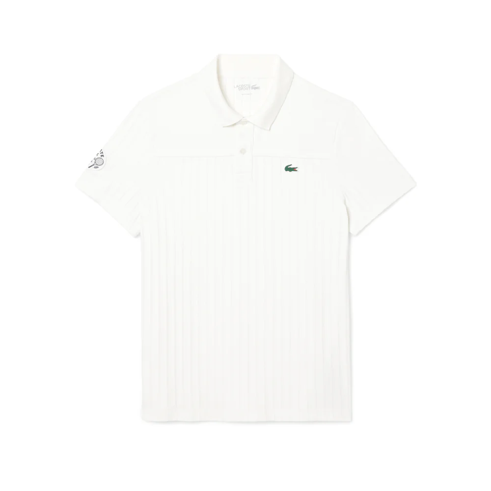 Polo de tennis héritage Ultra Dry avec badge